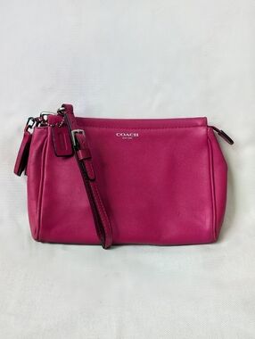 Coach Adult Pink Leather Zip Closure Wristlet With Leather Tassels